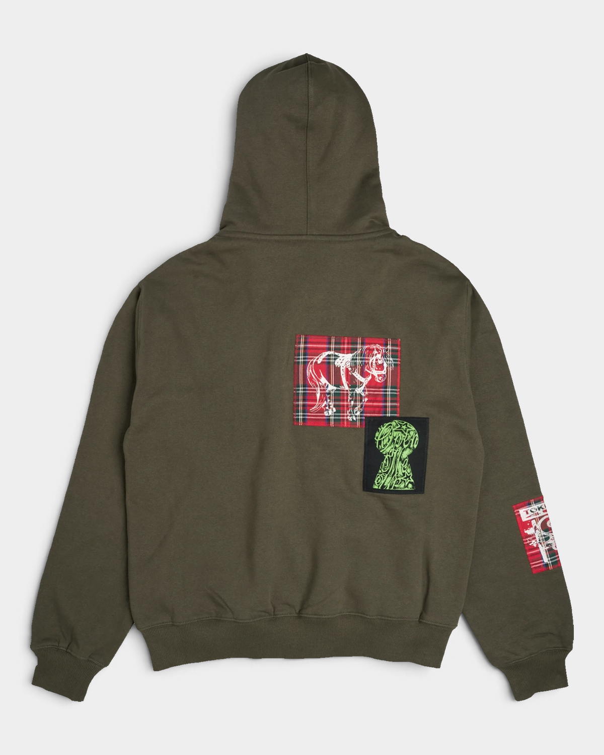 Lockwood Avenue Token Carly zip-up hoodie in olive green with printed and sewn patches, back view laid flat, with red tartan and black patches