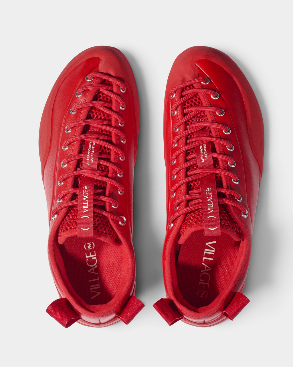Village PM 1PM Full Grain Leather Shoes in Red: an all red full grain leather low-top skate shoe with red laces and a red sole, the pair seen from above with the laces and the insoles