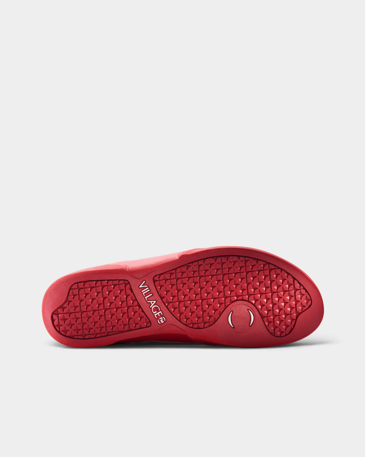 Village PM 1PM Full Grain Leather Shoes in Red: an all red full grain leather low-top skate shoe with red laces and a red sole, turned over to show the outsole and its tread pattern
