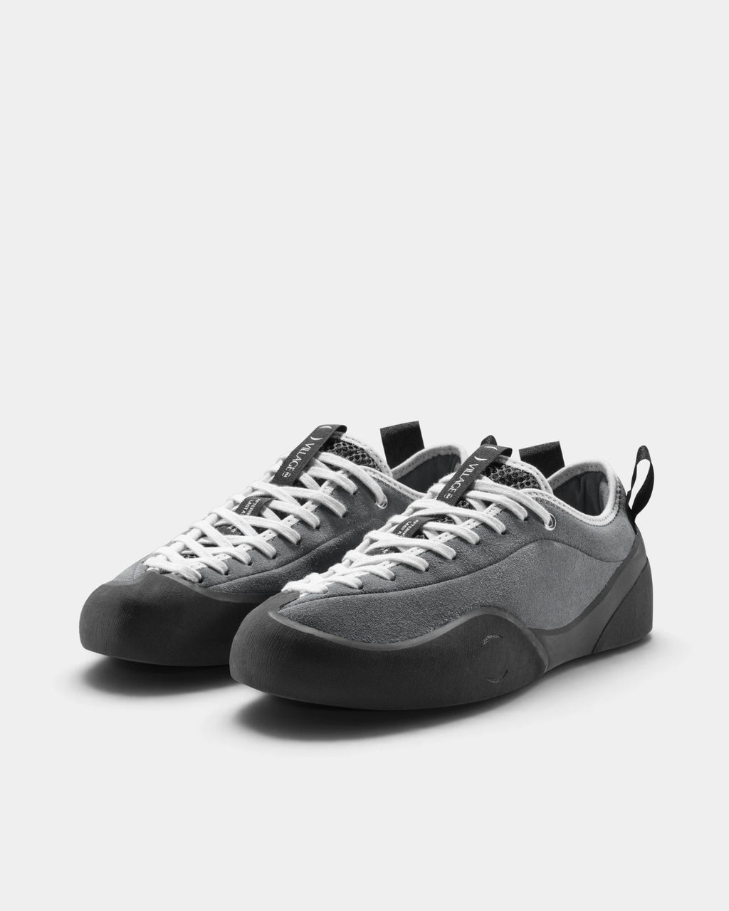Village PM 1PM Leather Suede Shoes in Grey/Natural Black: the pair seen from the front three-quarter angle, toes to the right. A grey leather and suede low-top skate shoe on a natural black gum outsole.