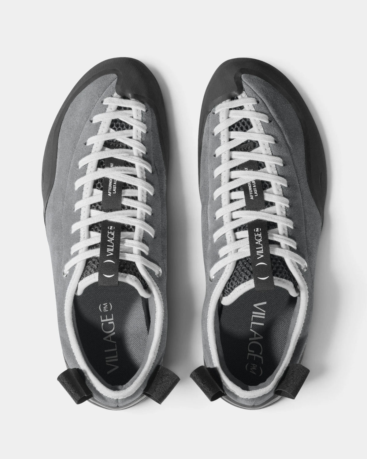 Village PM 1PM Leather Suede Shoes in Grey/Natural Black: the pair seen from directly above, toes up, showing the lacing and the tongue. A grey leather and suede low-top skate shoe on a natural black gum outsole.