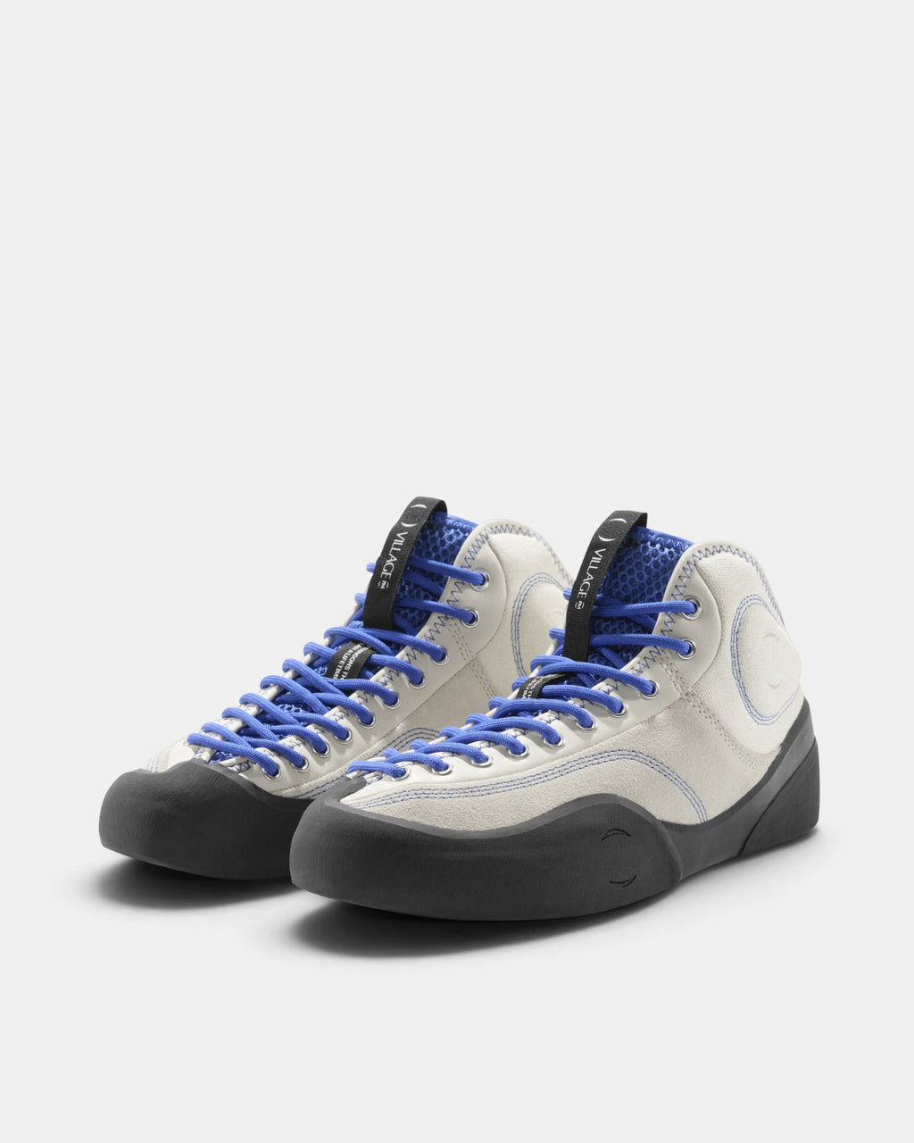 Village PM 1PM MID Leather Suede Shoes in Cream-Blue/Natural Black: the pair seen from the front three-quarter angle, toes to the right. A cream and blue leather and suede mid-top skate shoe on a natural black gum outsole.