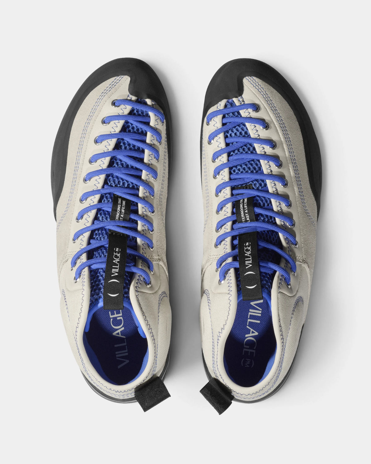 Village PM 1PM MID Leather Suede Shoes in Cream-Blue/Natural Black: the pair seen from directly above, toes up, showing the lacing and the tongue. A cream and blue leather and suede mid-top skate shoe on a natural black gum outsole.