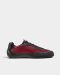 Village PM 2PM Synth Leather Shoes in Red/Natural Black: a red perforated leather low-top skate shoe with black overlays and a black sole, side view from the outer side, toe to the right