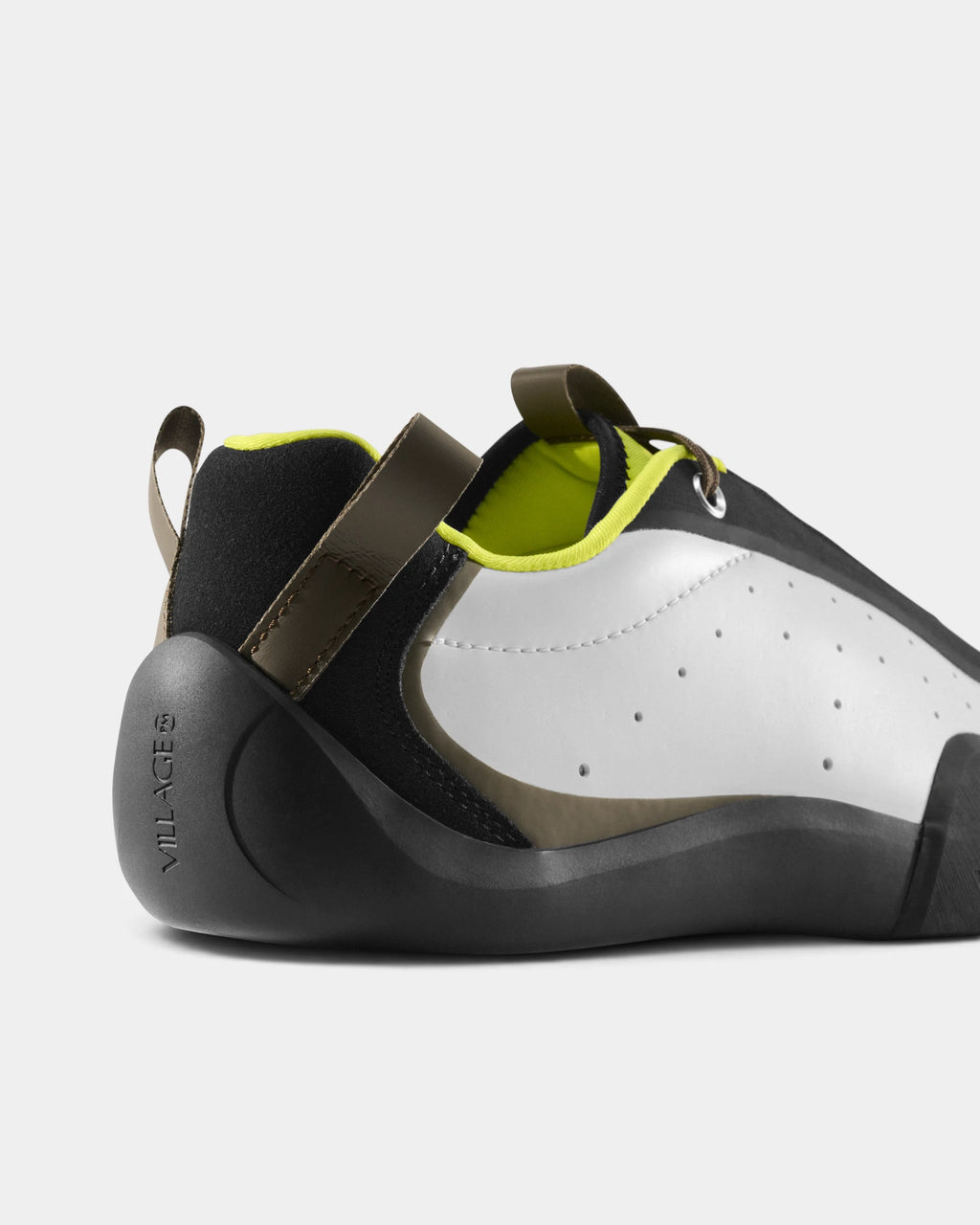 Village PM 2PM Synth Leather Shoes in White-Lime/Natural Black: a close three-quarter view of the heel and the outer side. A white and lime synthetic leather low-top skate shoe on a natural black gum outsole.