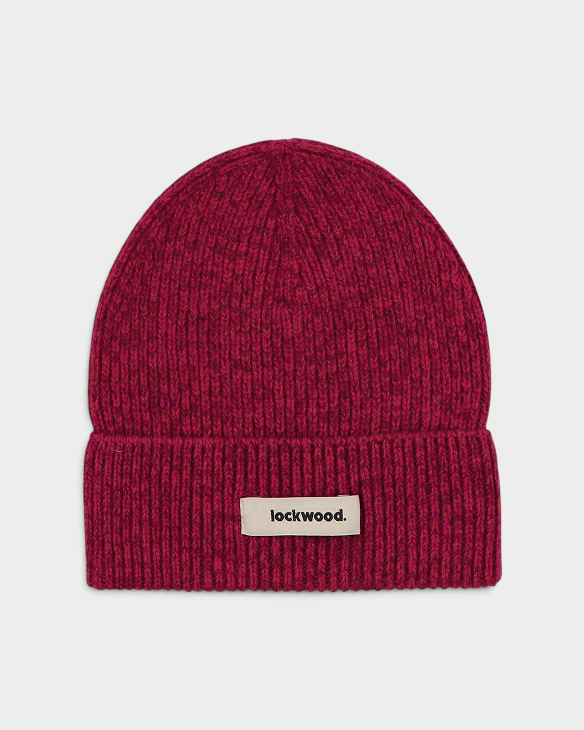 Lockwood Beanie in Red: a raspberry marl rib knit with a folded cuff and a woven lockwood label